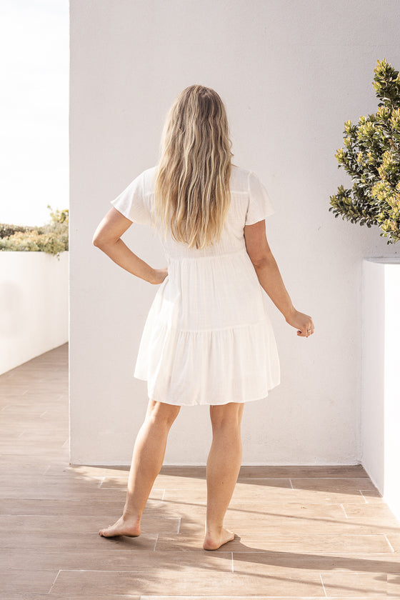 The Carlotta Dress is a summer favourite! a loose relaxed fit, what's not to love. Featuring a linen blend, button up front with floaty cap sleeves. The perfect shape to take you from the beach to brunch. Also available in Salmon from arlowboutique.com.au