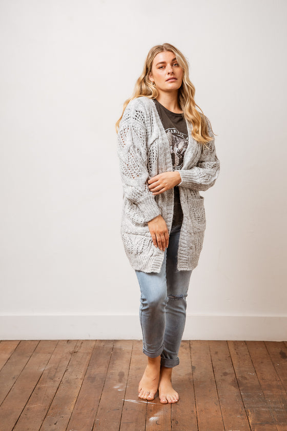 You can never have too many cardigans and our Geneva Knit Cardigan will be a great addition! Features an open front and contrasting cable & rib detailing. It's the perfect transition piece to have going into the cooler months and will work great as a layering piece.  Available from arlowboutique.com.au