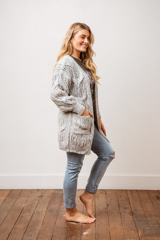 You can never have too many cardigans and our Geneva Knit Cardigan will be a great addition! Features an open front and contrasting cable & rib detailing. It's the perfect transition piece to have going into the cooler months and will work great as a layering piece. Available from arlowboutique.com.au