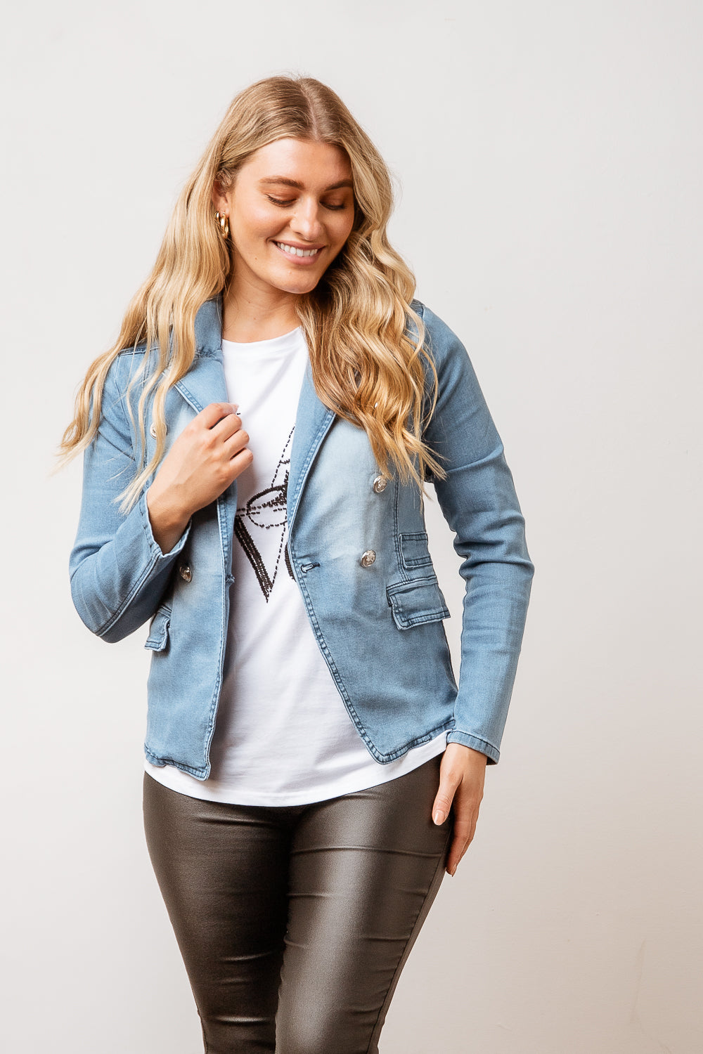 The Majella Jacket is two jackets in one, a blazer and an easy wear denim jacket.  Featuring silver coloured buttons and a tailored silhouette, this jacket is a piece that will elevate any outfit. Available from arlowboutique.com.au