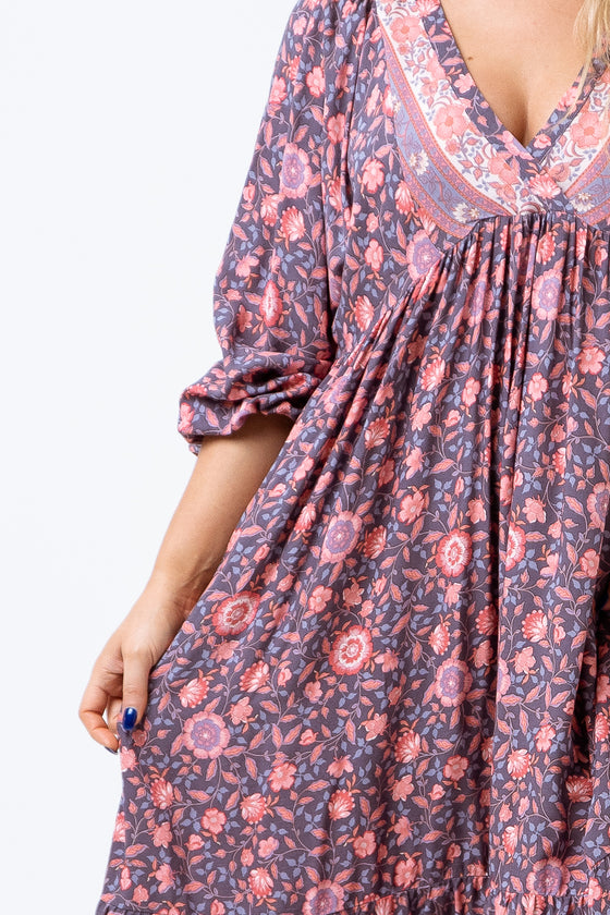 Take a break in the Maggie Midi Dress. Made with beautiful vintage inspired floral print rayon fabric and featuring a cross over front , shaped and gathered under bust, two tiered skirt and half length balloon sleeves. Perfect for holidays, weekends and any day in between. Available from www.arlowboutique.com