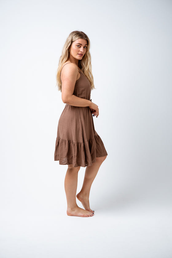 The Mia dress is a favourite! Linen, loose fitting, boho detailing, what's not to love. Features include button front, elastic waist and ties. The perfect style for any daytime occasion. Available from www.arlowboutique.com