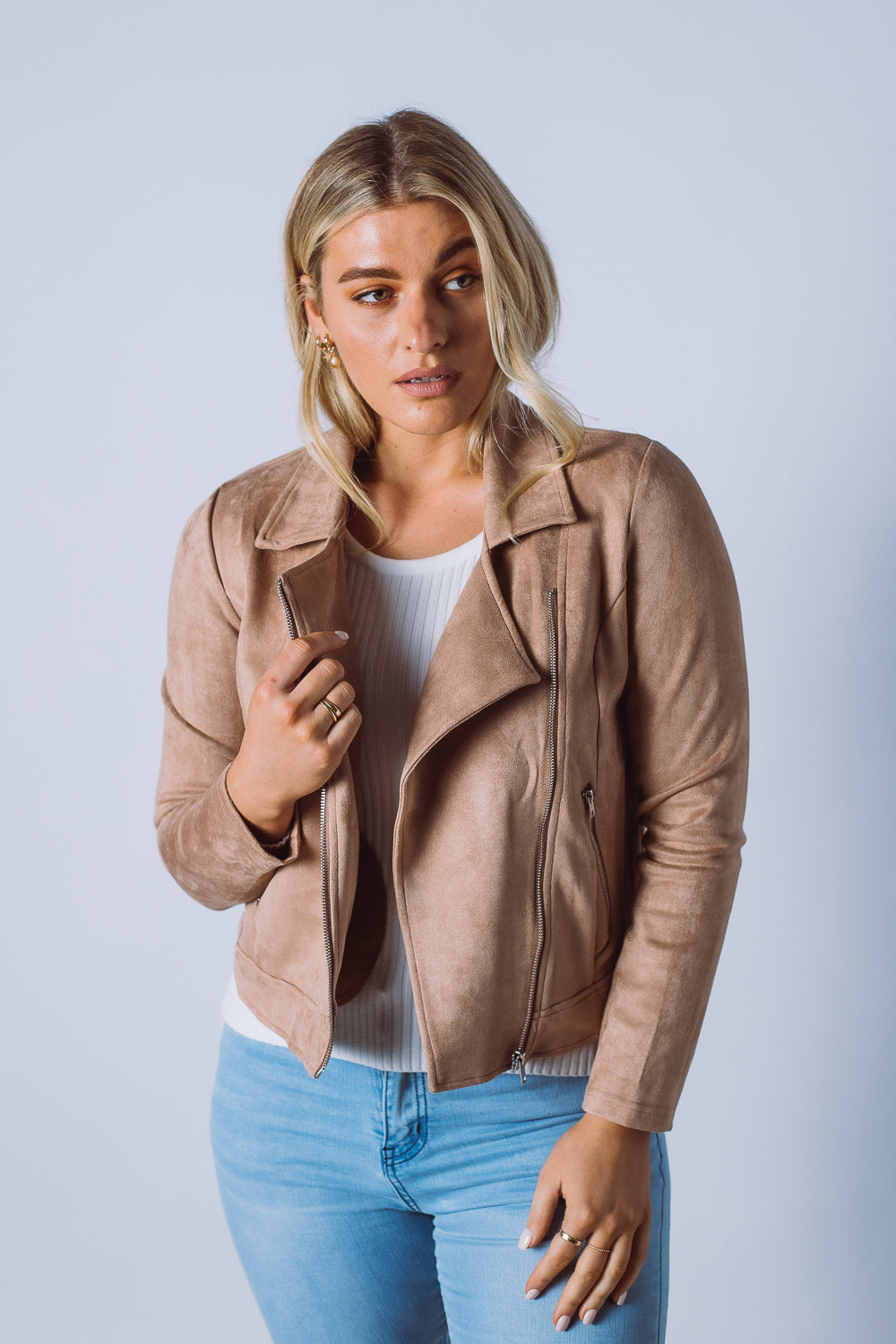 Create an urban aesthetic in the Rider jacket which is shaped to a waist length silhouette. Featuring a notched collar, asymmetric front zip closure, zip detailed pockets and finished in a soft faux suede fabric.   Available in 3 colours