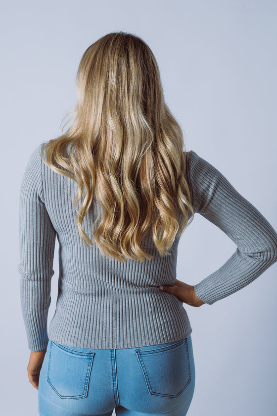 The Heritage Knit Top is the perfect basic, made from a fine rib knit fabric. Featuring a simple fitted shape, scoop neck and long sleeves. A fantastic transeasonal piece that you will be going back to year after year.  Available in 7 colours.