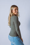 The Heritage Knit Top is the perfect basic, made from a fine rib knit fabric. Featuring a simple fitted shape, scoop neck and long sleeves. A fantastic transeasonal piece that you will be going back to year after year.  Available in 7 colours.