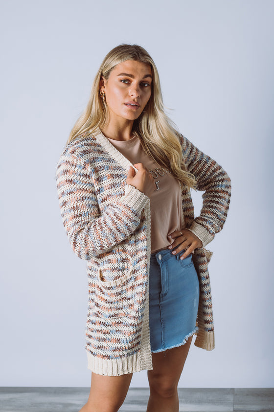 This effortless mid-length cardigan with pockets will keep you cute and cosy all year 'round! Also Available in Navy/ Multi from arlowboutique.com.au