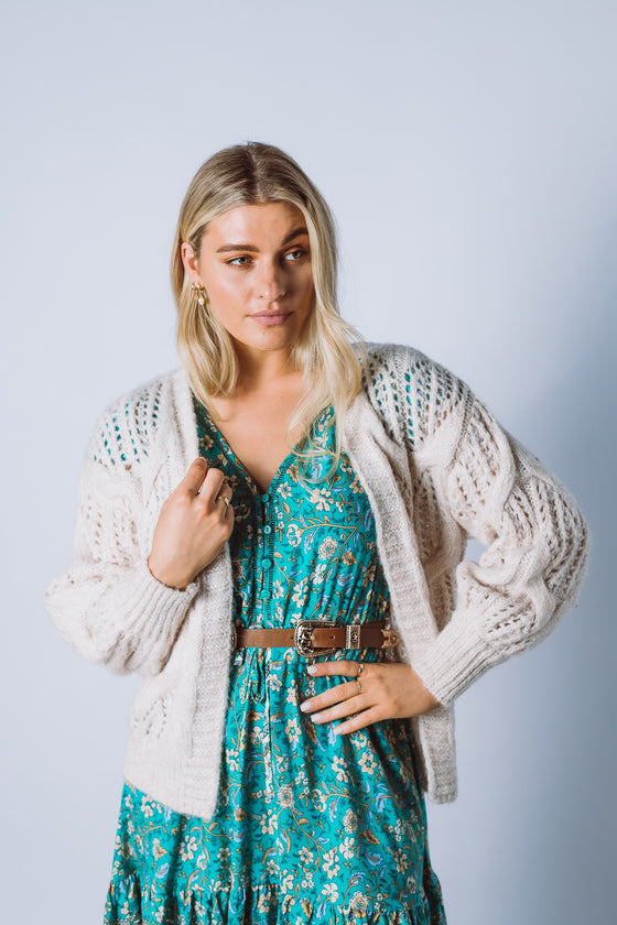 You can never have too many cardigans and our Veronica Knit Cardigan will be a great addition! This sits at the waist and features an open front and contrasting cable & rib detailing. It's the perfect transition piece to have going into the cooler months and will work great as a layering piece. Available from arlowboutique.com.au