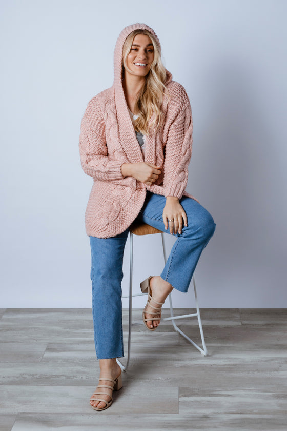 The Evie knit is a cosy easy to wear Cardigan. Featuring an open front with hoodie and cable detailing. Wear back with a pair of your favourite skinny jeans. Available from arlowboutique.com.au