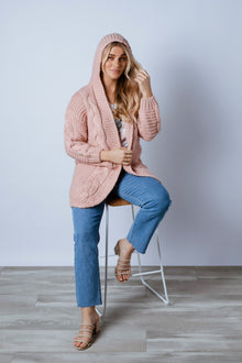  The Evie knit is a cosy easy to wear Cardigan. Featuring an open front with hoodie and cable detailing. Wear back with a pair of your favourite skinny jeans. Available from arlowboutique.com.au