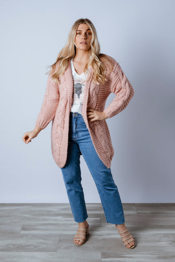 The Evie knit is a cosy easy to wear Cardigan. Featuring an open front with hoodie and cable detailing. Wear back with a pair of your favourite skinny jeans. Available from arlowboutique.com.au