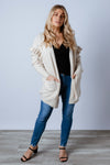Soft and femme. The Essie Knit Cardigan features a gorgeous cream colour, a soft knit yarn with off shoulder frill detailing, front pockets and a mid thigh body length. Available from arlowboutique.com.au  